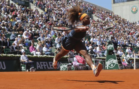 Associated Press/Michel Euler - Serena Williams, of the U.S, reaches for a ball as she plays Russia's Svetlana Kuznetsova during their quarterfinal match of the French Open tennis tournament at the Roland Garros stadium Tuesday, June 4, 2013 in Paris. (AP Photo/Michel Euler) 